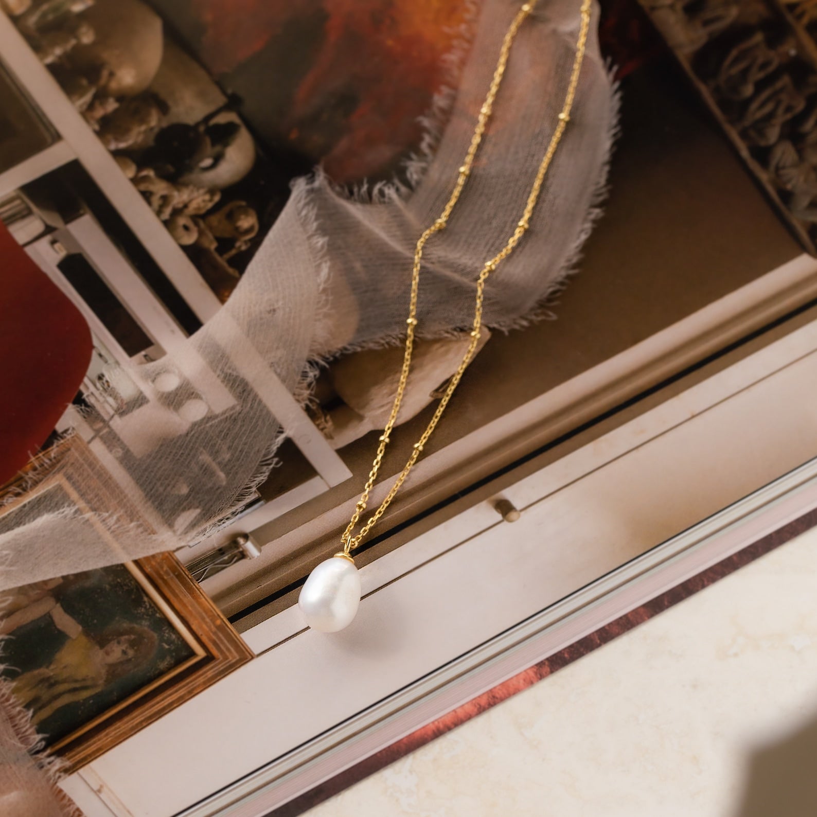 Timeless Elegance: Pearl Station Pendant Necklace